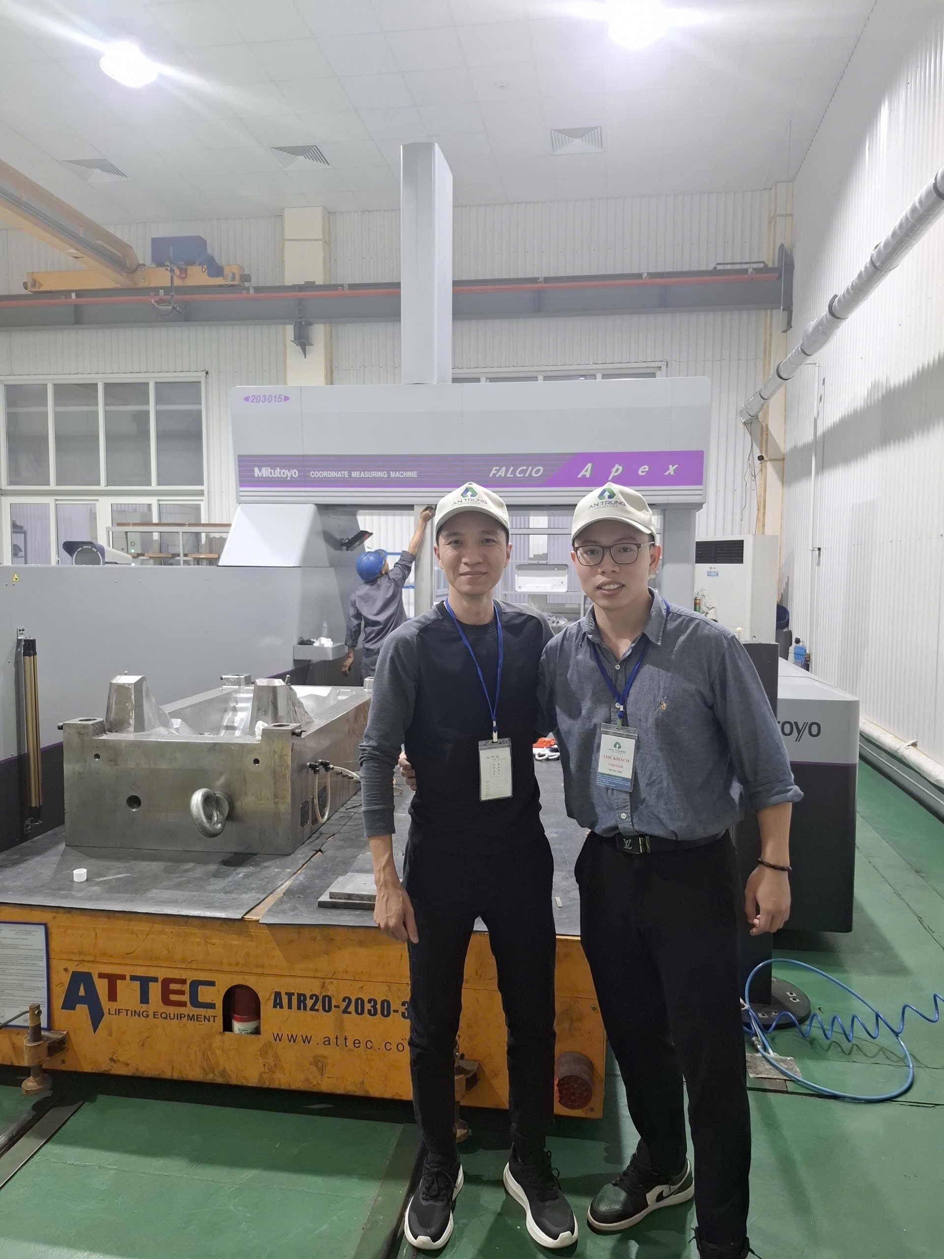 Lekker team at a precision measurement facility with a Mitutoyo CMM